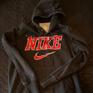 Nike Men's Charcoal Hoodie with Vibrant Red Accents